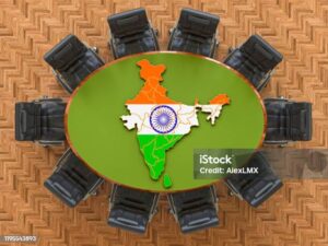 Functions of legislature, executive and judiciary in India Functions of the legislature, executive and judiciary in India shown through a round table meeting with the map of India symbolizing democratic governance.
